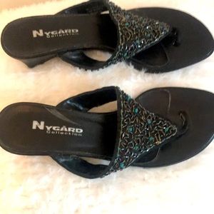 Nygard sandles in black with blue stones on top